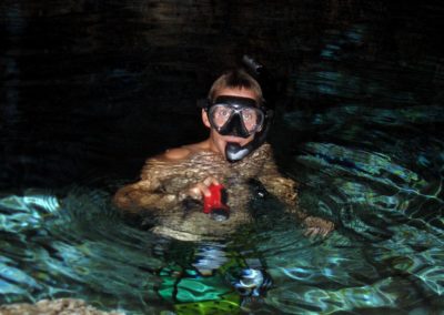 David snorkelling in underground lake at Chicho cave, Cotubanama National Park