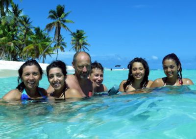 Family swimming at Canto de la Playa, Saona Island